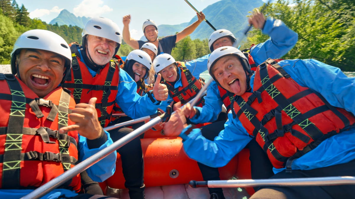 A whitewater rafting team going through safety onboarding